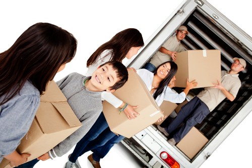 Careful handling of fragile items during packing and unpacking in Norwood