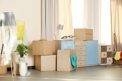 Organized packing materials and labeled moving boxes for Norwood relocations