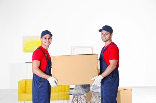 Removal team pricing a small apartment move in Norwood