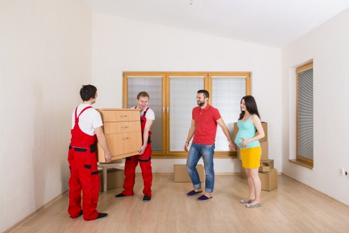 Office removals in Norwood planning with moving boxes and workspace equipment