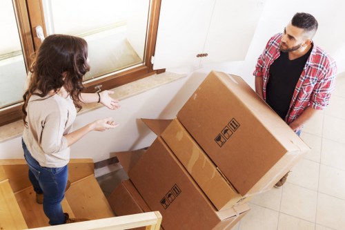 Staff assessing lifting risks during a removals job