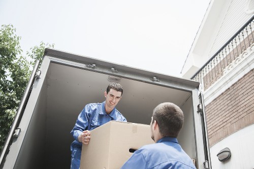 Commercial movers packing office equipment