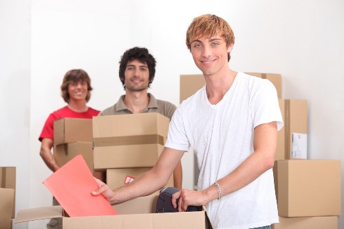 Fragile items wrapped and packed securely in boxes